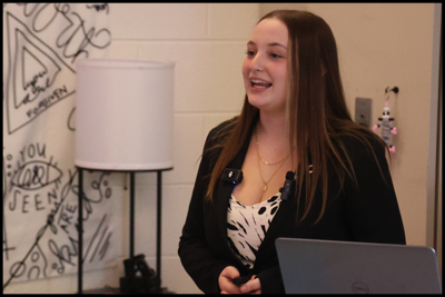 Student presenting their senior portfolio defense