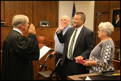 Dr. Nicely being sworn in as superintendent